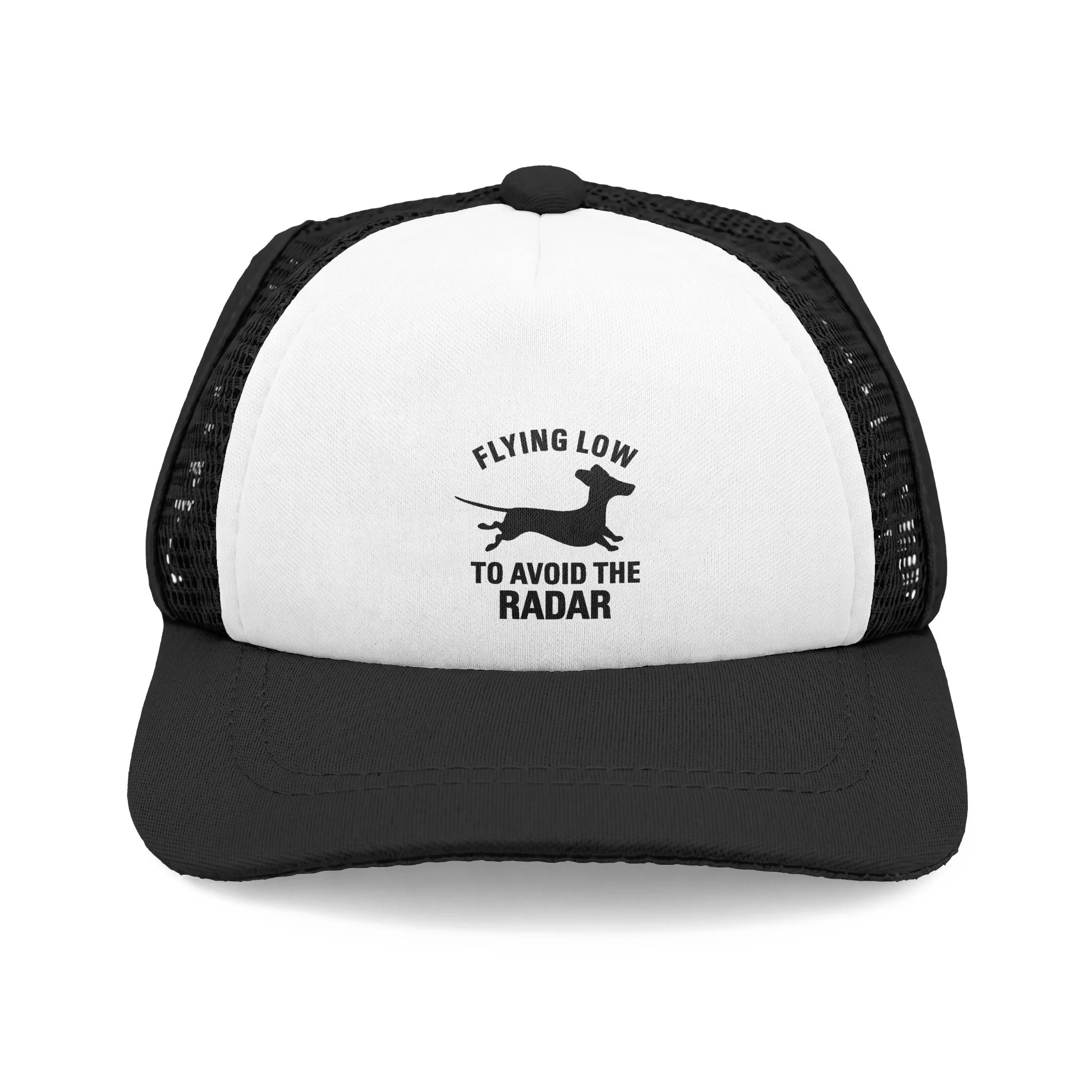 Black trucker hat with a white front panel displaying the slogan 'Flying low to avoid the radar' and a small silhouette of a dog.